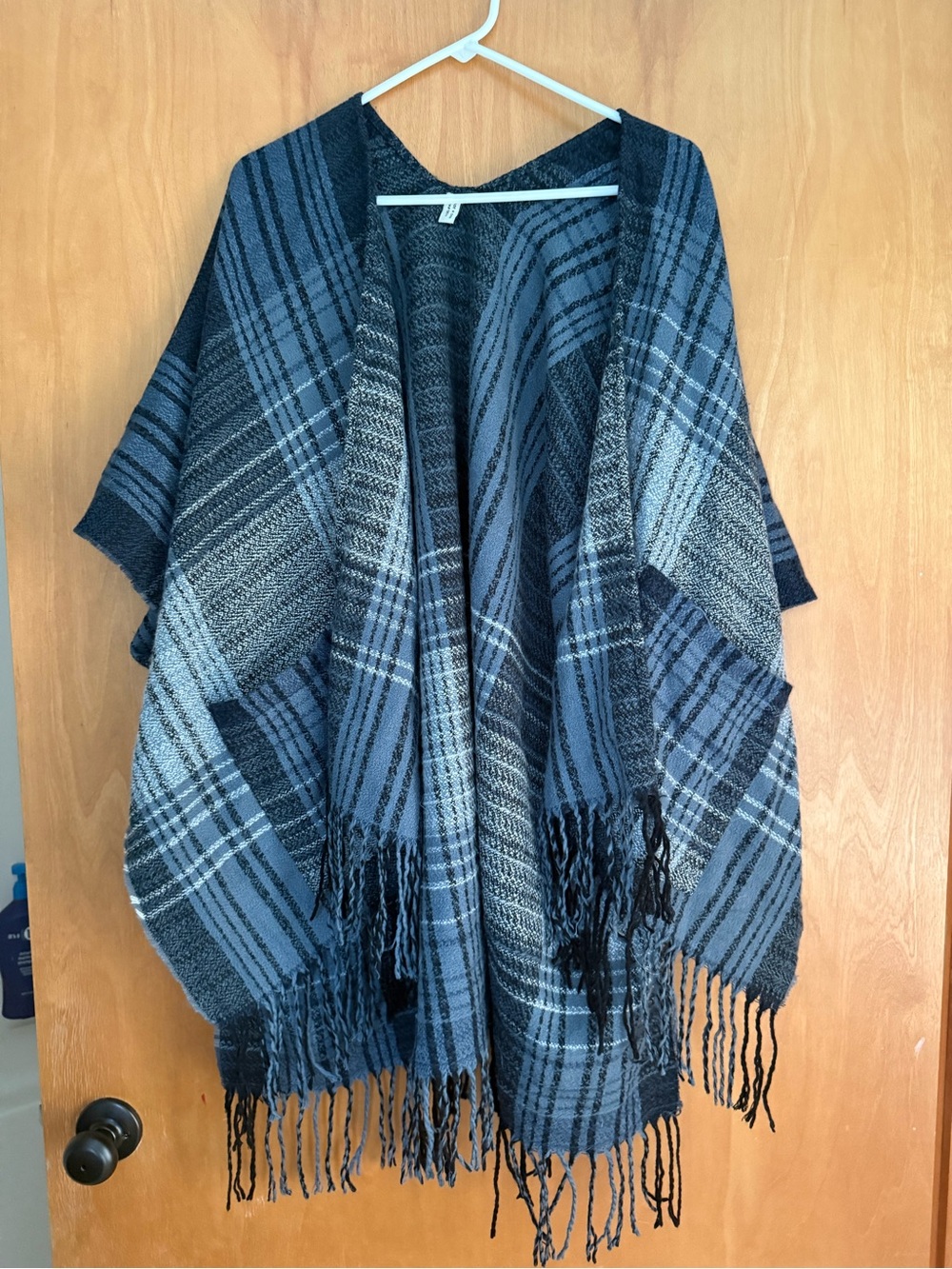 Open-Front Plaid Fringe Poncho Sweater in Blue and Black